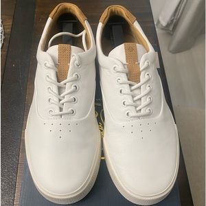 Men’s white Sperry shoes